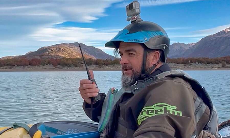 The guide coordinates the group by radio