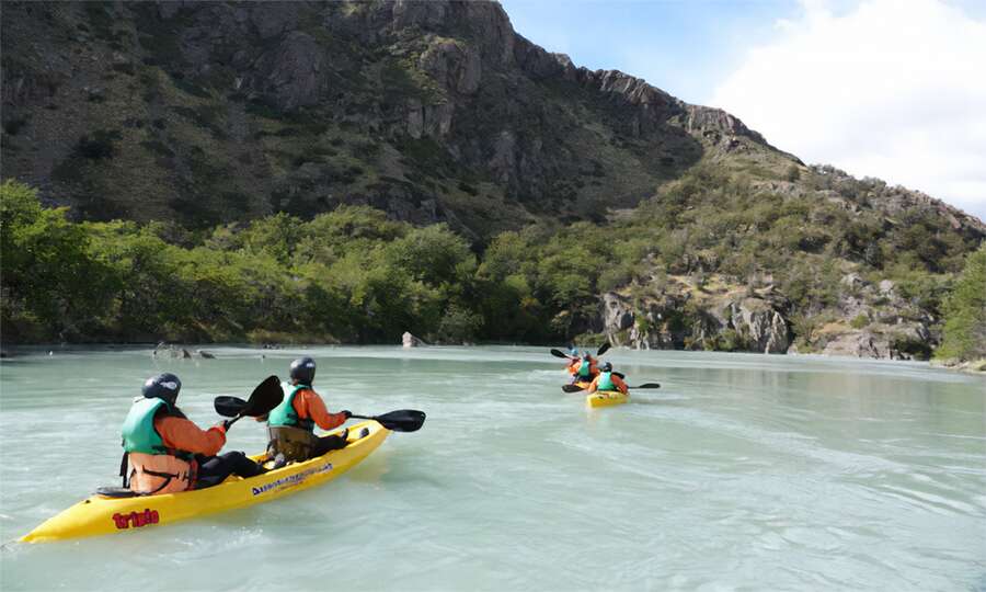Double kayak on a bend of the river
